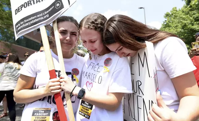 Supporters gather outside federal court in support of Marcelo Gomes da Silva, who was arrested on his way to volleyball practice last weekend, on Thursday, June 5, 2025 in Milford, Mass. (AP Photo/Mark Stockwell) (AP Photo/Mark Stockwell)