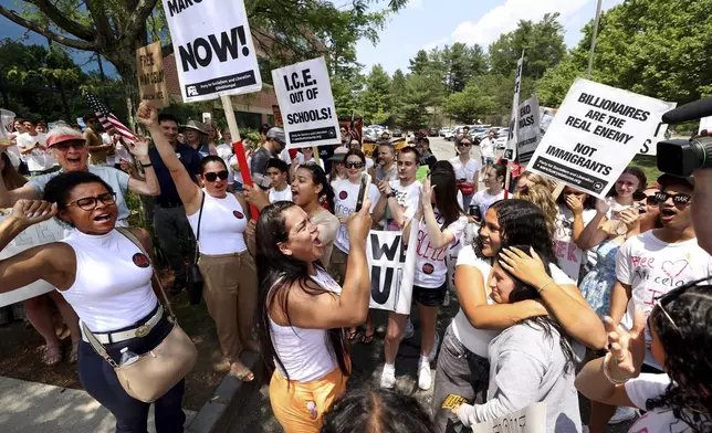Supporters gather outside federal court in support of Marcelo Gomes da Silva, who was arrested on his way to volleyball practice last weekend, on Thursday, June 5, 2025 in Milford, Mass.(AP Photo/Mark Stockwell)