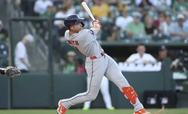 Houston Astros' Cam Smith hits a solo home run against the Athletics during the second inning of a baseball game Tuesday, June 17, 2025, in West Sacramento, Calif. (AP Photo/Scott Marshall)