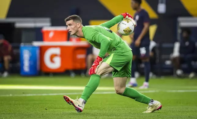 United States goalkeeper Matthew Freese (25) distributes the ball during a CONCACAF Gold Cup soccer match against Haiti, Sunday, June 22, 2025, in Arlington, Texas. (AP Photo/Jessica Tobias)