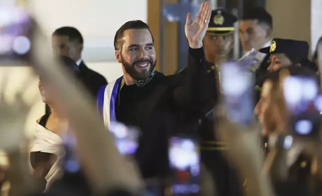 El Salvador's President Nayib Bukele arrives at the National Theater to deliver his annual address to Congress in San Salvador, El Salvador, Sunday, June 1, 2025. (AP Photo/Salvador Melendez)