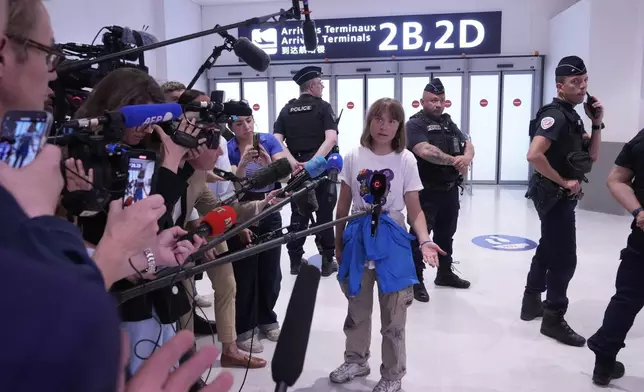 Activist Greta Thunberg arrives from Israel at Charles de Gaulle airport, north of Paris, Tuesday, June 10, 2025. (AP Photo/Michel Euler)