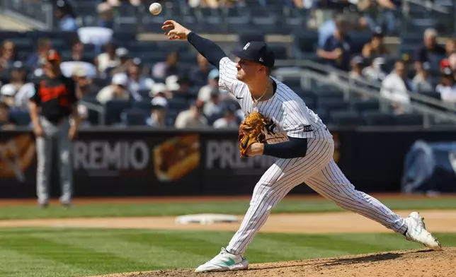 New York Yankees pitcher Clarke Schmidt throws during the seventh inning of a baseball game against the Baltimore Orioles, Saturday, June 21, 2025, in New York. (AP Photo/Noah K. Murray)