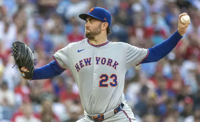 New York Mets starting pitcher David Peterson throws during the first inning of a baseball game against the Philadelphia Phillies, Sunday, June 22, 2025, in Philadelphia. (AP Photo/Laurence Kesterson)
