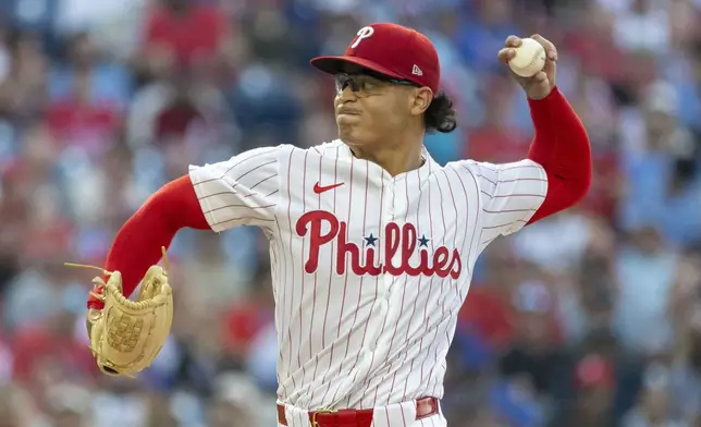 Philadelphia Phillies starting pitcher Jesus Luzardo throws during the first inning of a baseball game against the New York Mets, Sunday, June 22, 2025, in Philadelphia. (AP Photo/Laurence Kesterson)