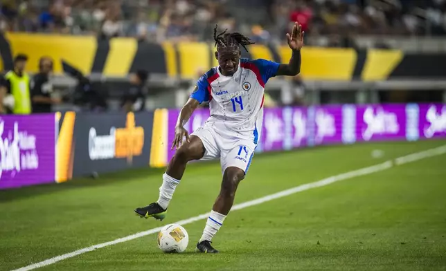 Haiti's Leverton Pierre controls the ball during a CONCACAF Gold Cup soccer match against the United States, Sunday, June 22, 2025, in Arlington, Texas. (AP Photo/Jessica Tobias)