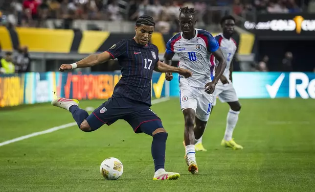 United States forward Malik Tillman (17) crosses the ball during a CONCACAF Gold Cup soccer match against Haiti, Sunday, June 22, 2025, in Arlington, Texas. (AP Photo/Jessica Tobias)
