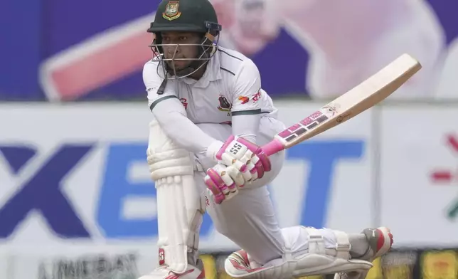 Bangladesh's Mushfiqur Rahim plays a shot during the fifth day of the first cricket test match between Sri Lanka and Bangladesh in Galle, Sri Lanka, Saturday, June 21, 2025. (AP Photo/Eranga Jayawardena)