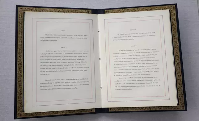 FILE - The Washington Treaty on display during a ceremony to mark the 75th anniversary of NATO at NATO headquarters in Brussels, Thursday, April 4, 2024. (AP Photo/Geert Vanden Wijngaert, File)