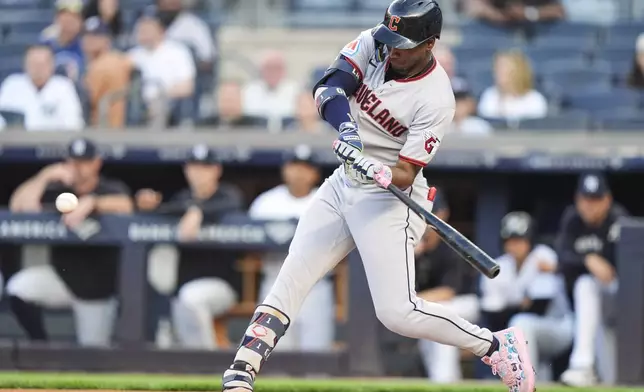 Cleveland Guardians' Angel Martínez hits a two-run home run during the first inning of a baseball game against the New York Yankees, Wednesday, June 4, 2025, in New York. (AP Photo/Frank Franklin II)