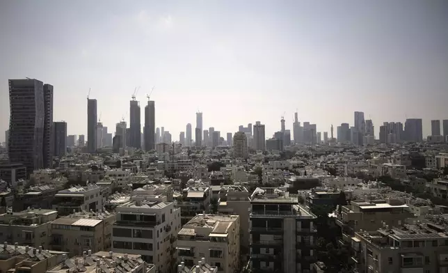 A general view of Tel Aviv's skyline, Friday, June 13, 2025. (AP Photo/Leo Correa)