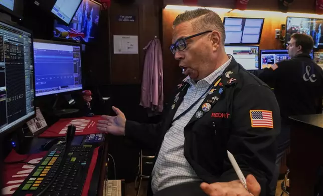 Trader Jonathan Mueller works on the floor of the New York Stock Exchange, Thursday, June 5, 2025. (AP Photo/Richard Drew)