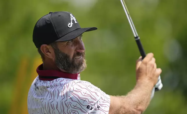 Dustin Johnson tees off on the 13th hole during a practice round ahead of the U.S. Open golf tournament at Oakmont Country Club Tuesday, June 10, 2025, in Oakmont, Pa. (AP Photo/Charlie Riedel)