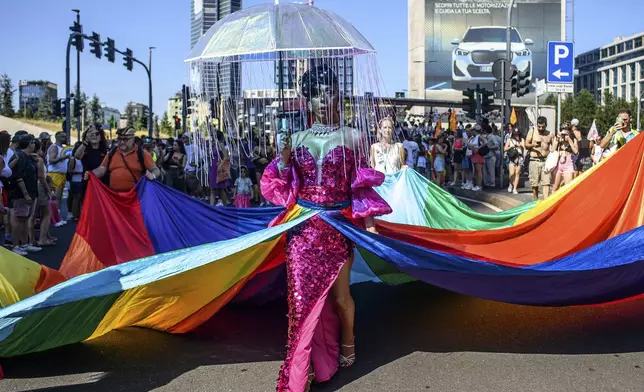 Participants march during the Milano Pride parade in Milan, Saturday, June 28, 2025. (Claudio Furlan/LaPresse via AP)