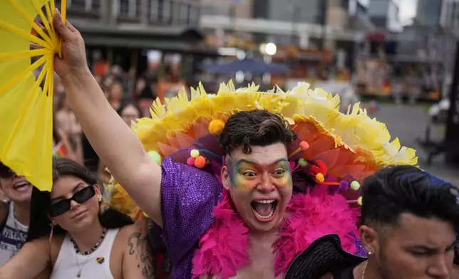 Nicole Richards cheers while watching the Nashville Pride Parade, Saturday, June 28, 2025, in Nashville, Tenn. (AP Photo/George Walker IV)