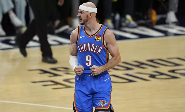 Oklahoma City Thunder guard Alex Caruso (9) celebrates during the second half of Game 4 of the NBA Finals basketball series against the Indiana Pacers, Friday, June 13, 2025, in Indianapolis. (AP Photo/Abbie Parr)