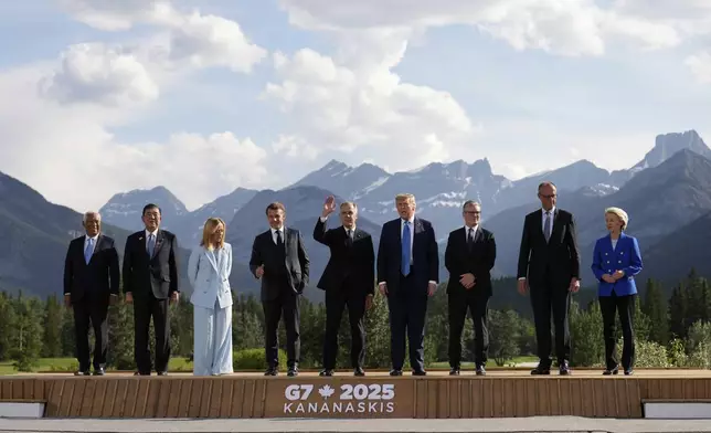 From left, European Council President Antonio Costa, Japan's Prime Minister Shigeru Ishiba, Italy's Prime Minister Giorgia Meloni, France's President Emmanuel Macron, Canada's Prime Minister Mark Carney, President Donald Trump, Britain's Prime Minister Keir Starmer, Germany's Chancellor Friedrich Merz, and European Commission President Ursula von der Leyen pose for a group photo at the G7 Summit, Monday, June 16, 2025, in Kananaskis, Canada. (AP Photo/Mark Schiefelbein)