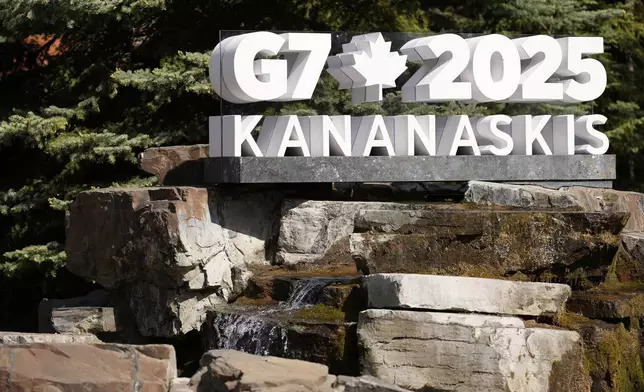 Signage for the G7 Summit is pictured before the official welcome, Monday, June 16, 2025, in Kananaskis, Canada. (AP Photo/Mark Schiefelbein)