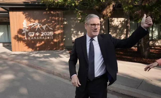 Britain's Prime Minister Keir Starmer speaks to the media at the G7 summit, in Kananaskis, Alberta, Canada, Monday, June 16, 2025. (Suzanne Plunkett/Pool Photo via AP)