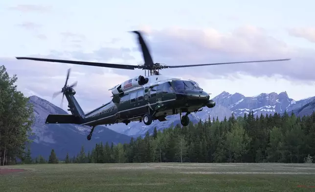 U.S. President Donald Trump arrives at the G7 Summit in Kananaskis, Alberta, Sunday, June 15, 2025. (Adrian Wyld/The Canadian Press via AP)