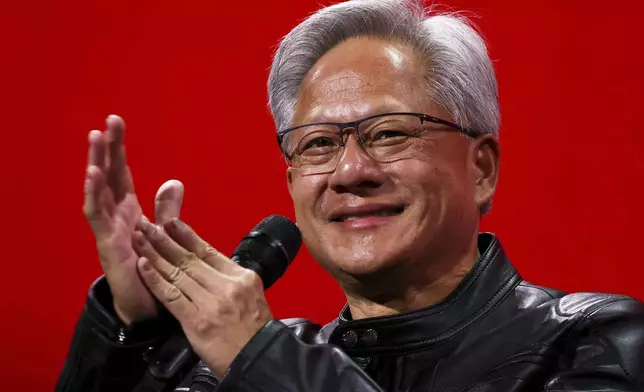 Nvidia CEO Jensen Huang attends a round table discussion at the VivaTech fair dedicated to innovation and startups in Paris, Wednesday, June 11, 2025. (Sarah Meyssonnier/Pool via AP)