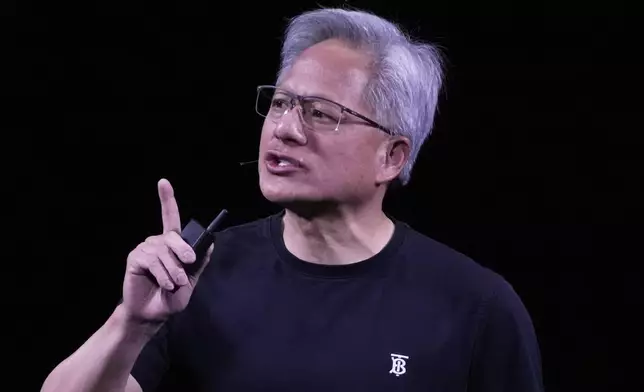 NVIDIA CEO Jensen Huang delivers his keynote address Wednesday, June 11, 2025 at the Vivatech fair in Paris. (AP Photo/Michel Euler)