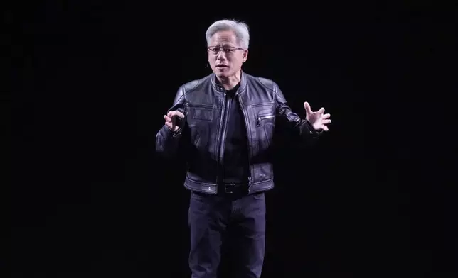 NVIDIA CEO Jensen Huang delivers his keynote address Wednesday, June 11, 2025 at the Vivatech fair in Paris. (AP Photo/Michel Euler)