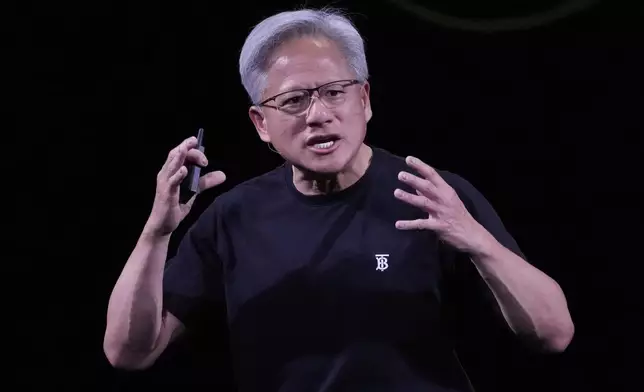 NVIDIA CEO Jensen Huang delivers his keynote address Wednesday, June 11, 2025 at the Vivatech fair in Paris. (AP Photo/Michel Euler)