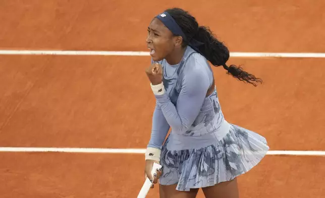 Coco Gauff of the U.S. reacts as she plays against Madison Keys of the U.S. during their quarterfinal match of the French Tennis Open at the Roland-Garros stadium in Paris, Wednesday, June 4, 2025. (AP Photo/Christophe Ena)