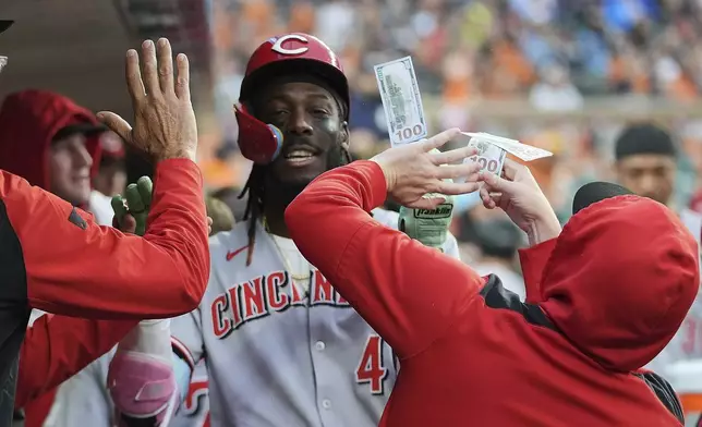 Cincinnati Reds' Elly De La Cruz (44) celebrates his home run against the Detroit Tigers in the fifth inning during a baseball game, Friday, June 13, 2025, in Detroit. (AP Photo/Paul Sancya)