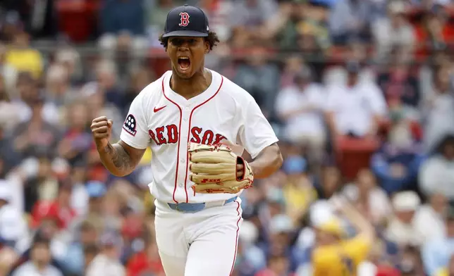 Boston Red Sox's Brayan Bello reacts after striking out New York Yankees' J.C. Escarra to end the seventh inning of a baseball game, Sunday, June 15, 2025, in Boston. (AP Photo/Greg M. Cooper)