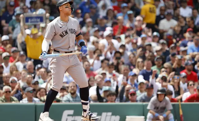 New York Yankees' Aaron Judge reacts after striking out in the third inning of a baseball game against the Boston Red Sox, Sunday, June 15, 2025, in Boston. (AP Photo/Greg M. Cooper)