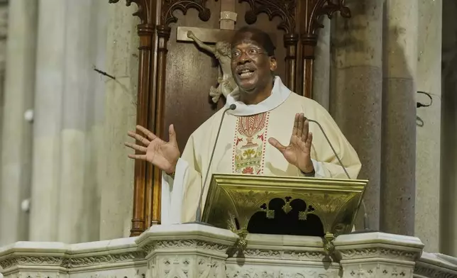 Father Gregory Chisholm, S.J. speaks during the funeral for former Rep. Charles Rangel, D-N.Y., at New York's St. Patrick's Cathedral, Friday, June 13, 2025. (AP Photo/Richard Drew)