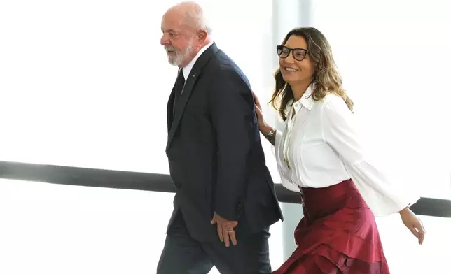FILE - Brazil's President Luiz Inacio Lula da Silva and first lady Rosangela Silva arrive to a military promotion ceremony, in Brasilia, Brazil, April 4, 2023. (AP Photo/Eraldo Peres, File)
