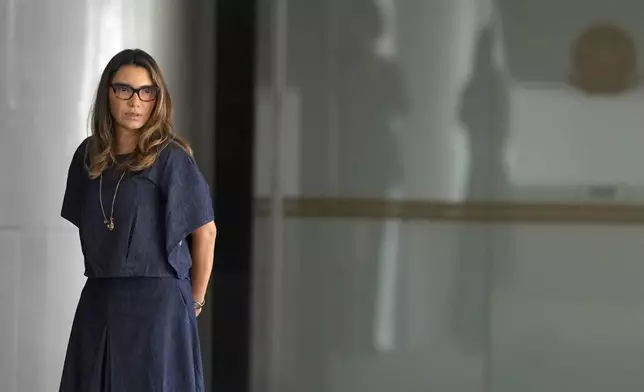 FILE - First lady Rosangela da Silva waits for the start of a ministerial swearing-in ceremony at Planalto Palace in Brasilia, Brazil, Jan. 14, 2025. (AP Photo/Eraldo Peres)