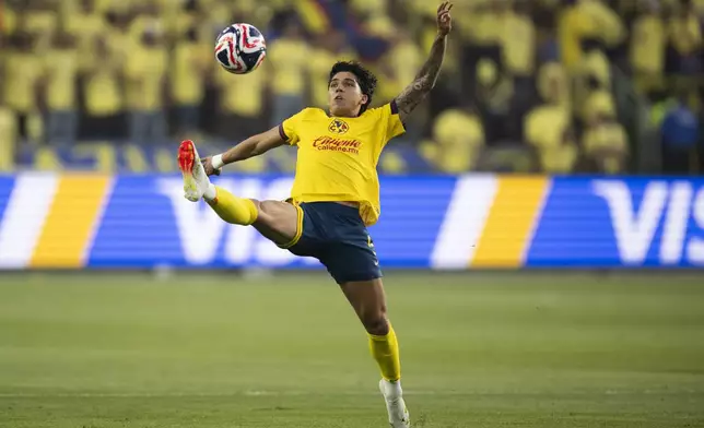 Club América defender Kevin Álvarez reaches for the ball during the first half of a FIFA Club World Cup play-in soccer match against Los Angeles FC, Saturday, May 31, 2025, in Los Angeles. (AP Photo/Kyusung Gong)