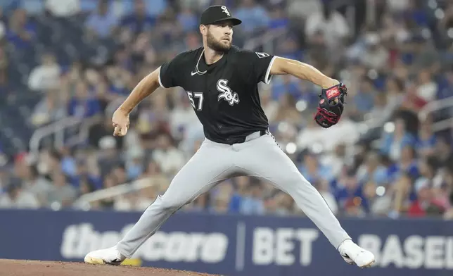 Chicago White Sox pitcher Adrian Houser works against Toronto Blue Jays during the first inning of a baseball game in Toronto, Sunday June 22, 2025. (Chris Young/The Canadian Press via AP)