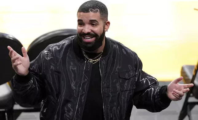 Rapper Drake gestures after watching an NBA basketball Western Conference Play-In game between the Los Angeles Lakers and the Golden State Warriors Wednesday, May 19, 2021, in Los Angeles. The Lakers won 103-100. (AP Photo/Mark J. Terrill)
