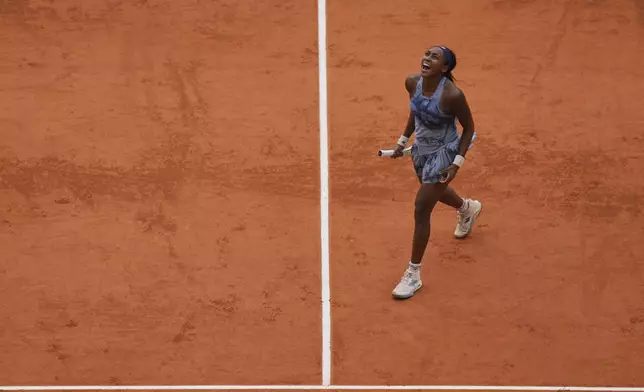 United States' Coco Gauff celebrates after winning the final match of the French Tennis Open at the Roland-Garros against Aryna Sabalenka of Belarus in Paris, Saturday, June 7, 2025. (AP Photo/Thibault Camus)