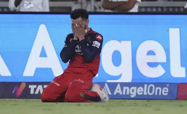 Royal Challengers Bengaluru's Virat Kohli reacts after their win in the Indian Premier League final cricket match against Punjab Kings at Narendra Modi Stadium in Ahmedabad, India, Tuesday, June 3, 2025. (AP Photo/Ajit Solanki)