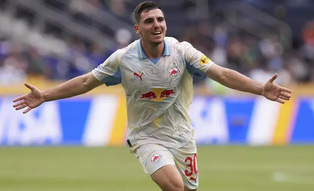 Red Bull Salzburg's Oscar Gloukh celebrates after scoring his side's opening goal during the Club World Cup group H soccer match between CF Pachuca and FC Salzburg in Cincinnati, Wednesday, June 18, 2025. (AP Photo/Jeffrey Dean)