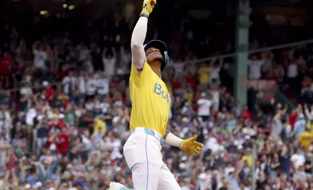 Boston Red Sox's Ceddanne Rafaela gestures after hitting a home run during the sixth inning of a baseball game against the Toronto Blue Jays, Saturday, June 28, 2025, in Boston. (AP Photo/Mark Stockwell)