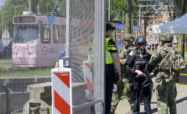 Security patrol around the perimeter of the venue ahead of the upcoming NATO summit in The Hague, Netherlands, Monday, June 23, 2025. (AP Photo/Patrick Post)