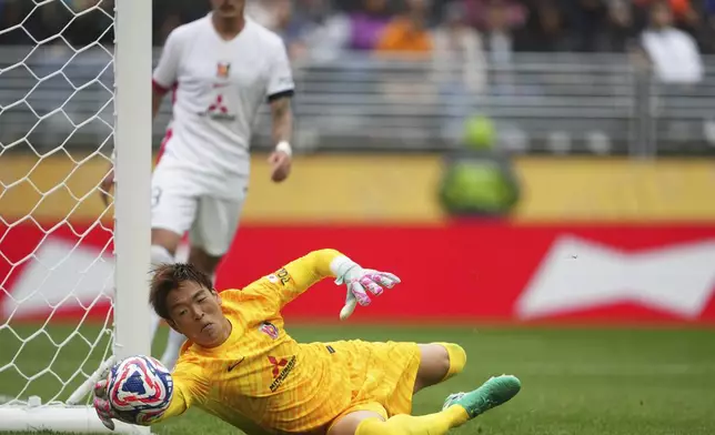Urawa Red Diamonds' Shusaku Nishikawa makes a save during the Club World Cup Group E soccer match between Inter Milan and Urawa Red Diamonds in Seattle, Saturday, June 21, 2025. (AP Photo/Lindsey Wasson)