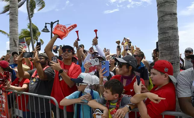 Florida Panthers fans attend the NHL hockey team's Stanley Cup championship celebration, Sunday, June 20, 2022, in Fort Lauderdale, Fla. (AP Photo/Michael Laughlin)