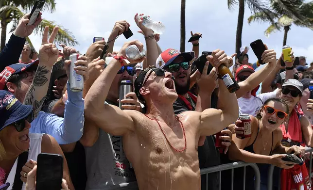 Florida Panthers' Nico Sturm celebrates with fans during the NHL hockey team's Stanley Cup championship celebration, Sunday, June 22, 2022, in Fort Lauderdale, Fla. (AP Photo/Michael Laughlin)