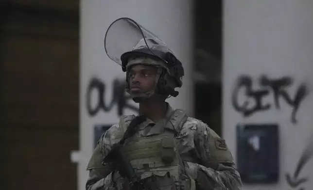 California National Guards guard Federal Building in downtown Los Angeles, Tuesday, June 10, 2025. (AP Photo Damian Dovarganes)