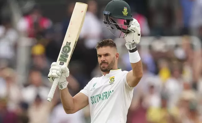 South Africa's Aiden Markram celebrates after scoring a century on day three of the World Test Championship final between South Africa and Australia at Lord's cricket ground in London, Friday, June 13, 2025. (AP Photo/Kirsty Wigglesworth)
