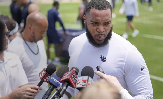 Tennessee Titans defensive tackle Jeffery Simmons speaks during a news conference after practice at NFL football minicamp, Tuesday, June 10, 2025, in Nashville, Tenn. (AP Photo/George Walker IV)