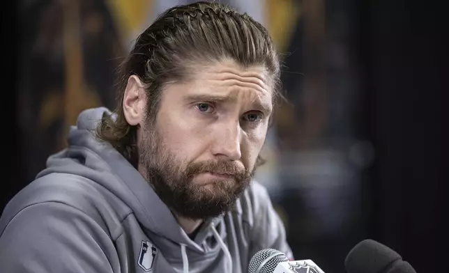 Florida Panthers goalie Sergei Bobrovsky (72) speaks to media during a news conference, Tuesday, June 3, 2025, in Edmonton, Alberta, ahead of Game 1 of the NHL hockey Stanley Cup final series against the Edmonton Oilers. (Jason Franson/The Canadian Press via AP)